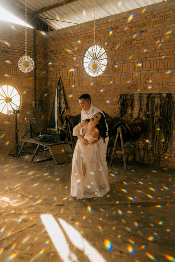 A magical wedding reception venue illuminated with a rainbow of lights